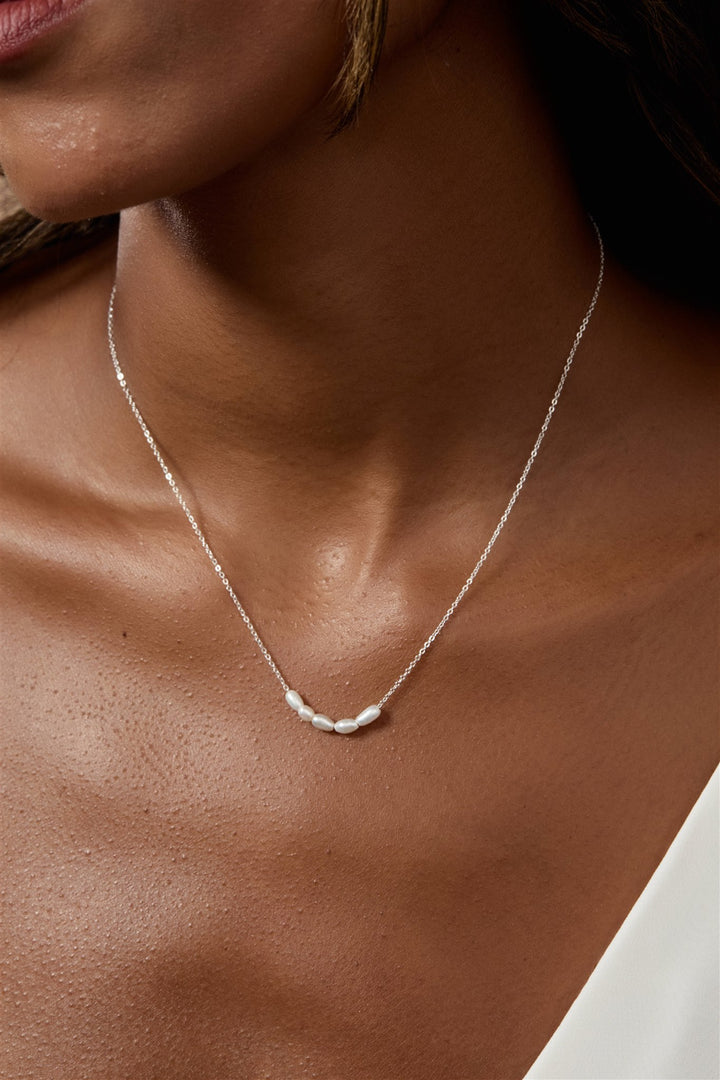 Elegant 16" freshwater pearl necklace on a 14k gold-filled or sterling silver cable chain. Delicate floating pearls add a refined touch to any look.