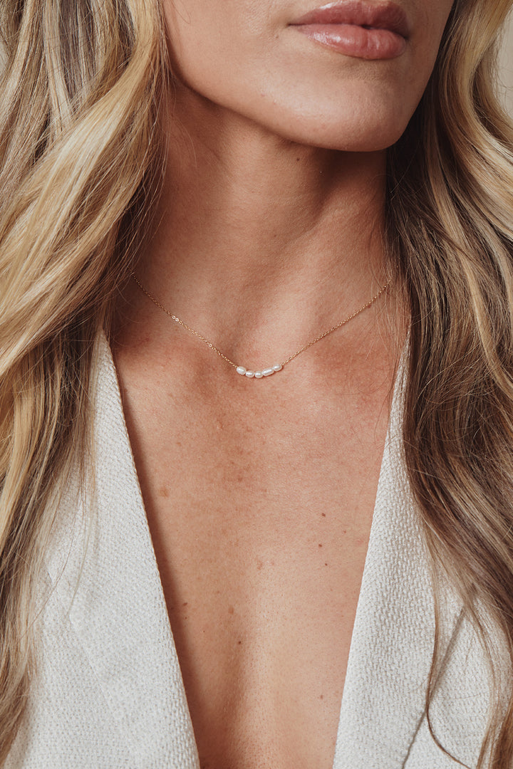 Elegant 16" freshwater pearl necklace on a 14k gold-filled or sterling silver cable chain. Delicate floating pearls add a refined touch to any look.