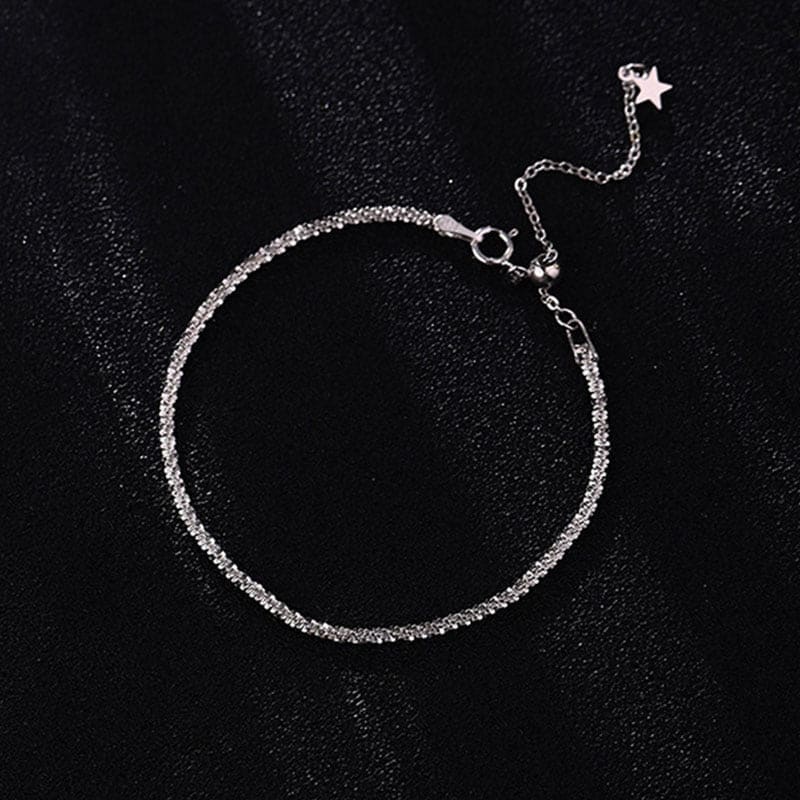 Elegant and adjustable steel chain bracelet with a polished finish. Lightweight and versatile, perfect for everyday wear or special occasions.