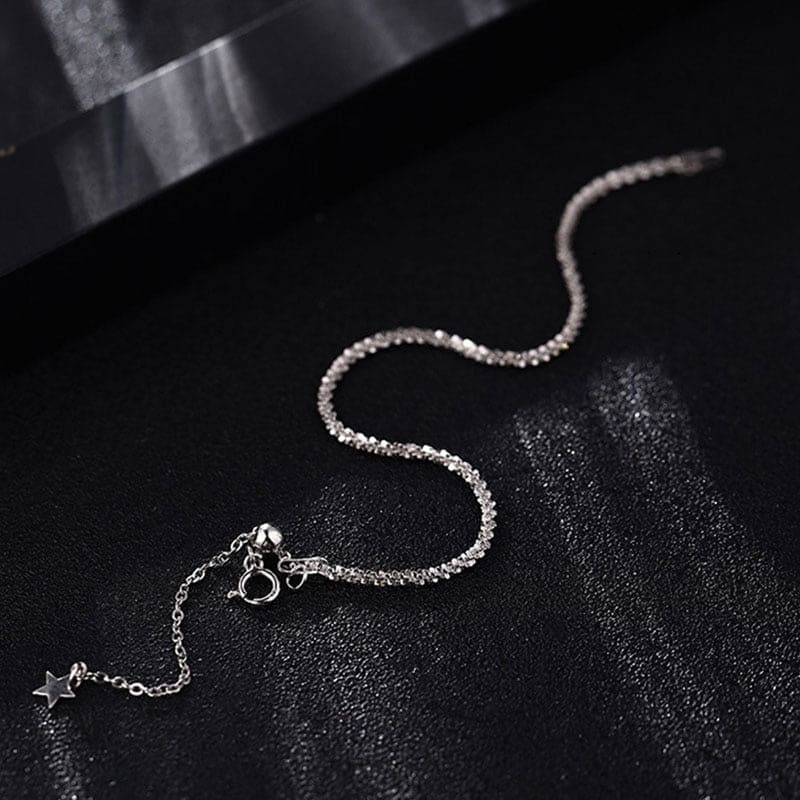 Elegant and adjustable steel chain bracelet with a polished finish. Lightweight and versatile, perfect for everyday wear or special occasions.