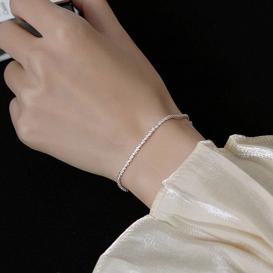 Elegant and adjustable steel chain bracelet with a polished finish. Lightweight and versatile, perfect for everyday wear or special occasions.